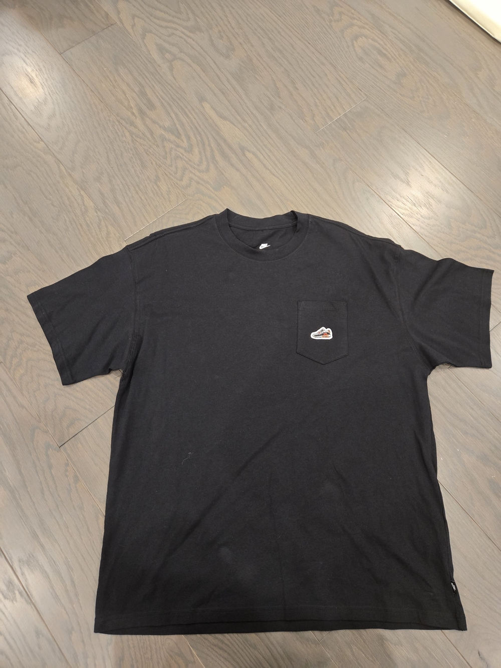 Nike Black Short Sleeve Pocket Tee with Small Patch Logo